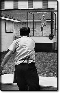 Pitching softballs at the dunk tank